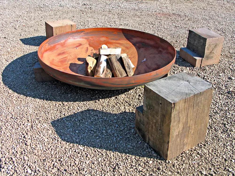 Fire pit with large timber seats